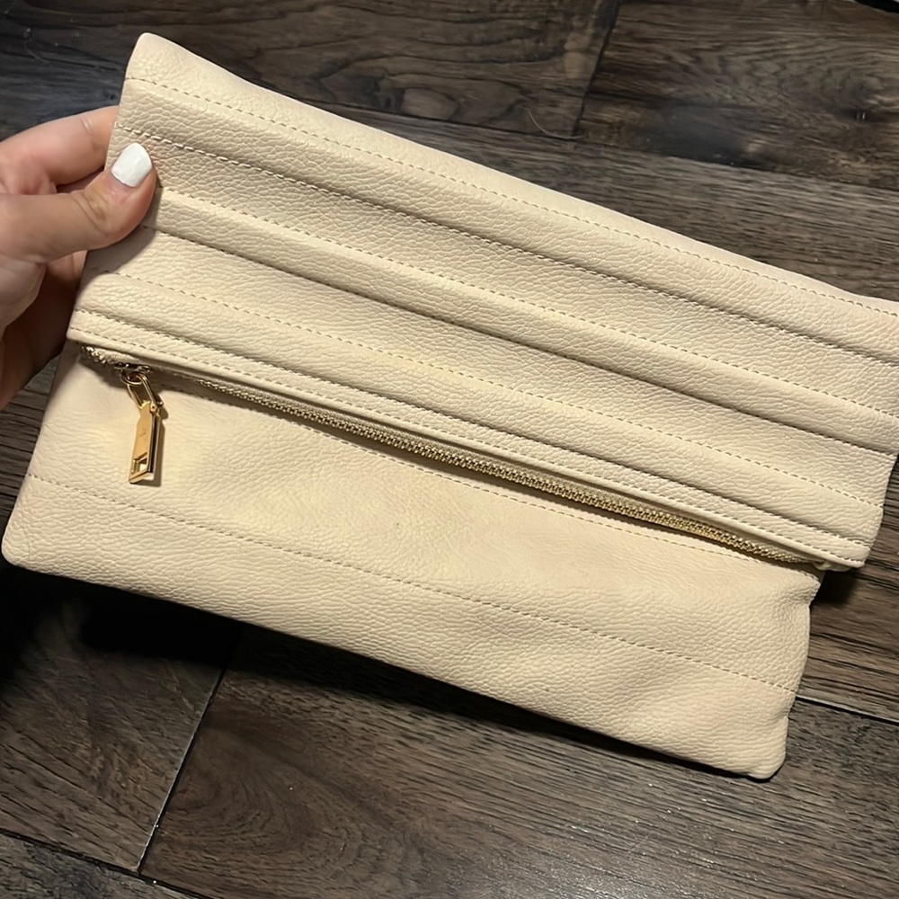Large multi pocket clutch strap included